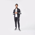 Men’s black athletic tracksuit with side stripes for gym and casual style.