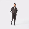 Men’s chocolate athletic tracksuit with side stripes for gym and casual style.
