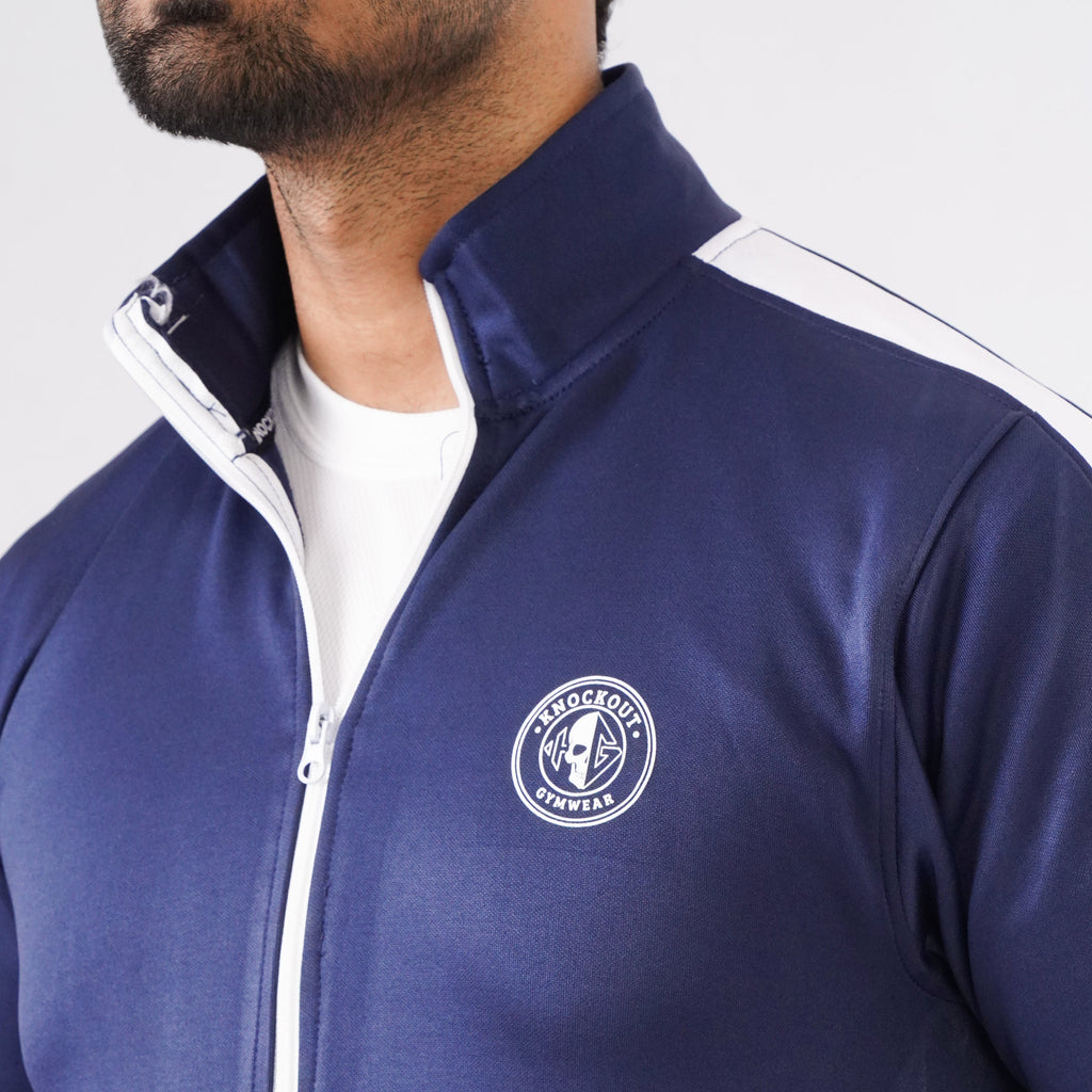 Men’s navy blue athletic tracksuit with side stripes for gym and casual style.
