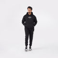Black oversized tracksuit for men with a relaxed, comfortable fit.
