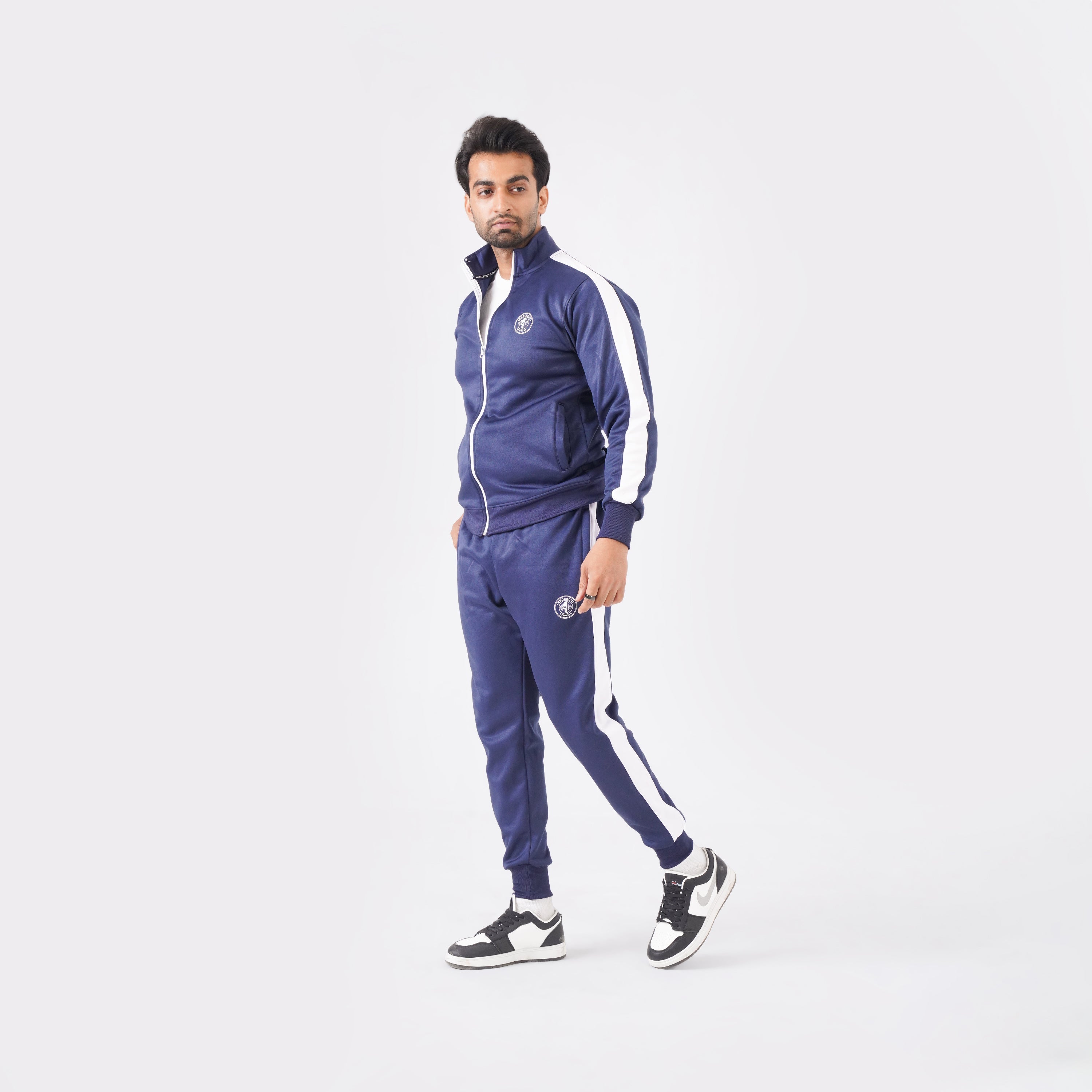Men’s Navy blue athletic tracksuit with side stripes for gym and casual style.
