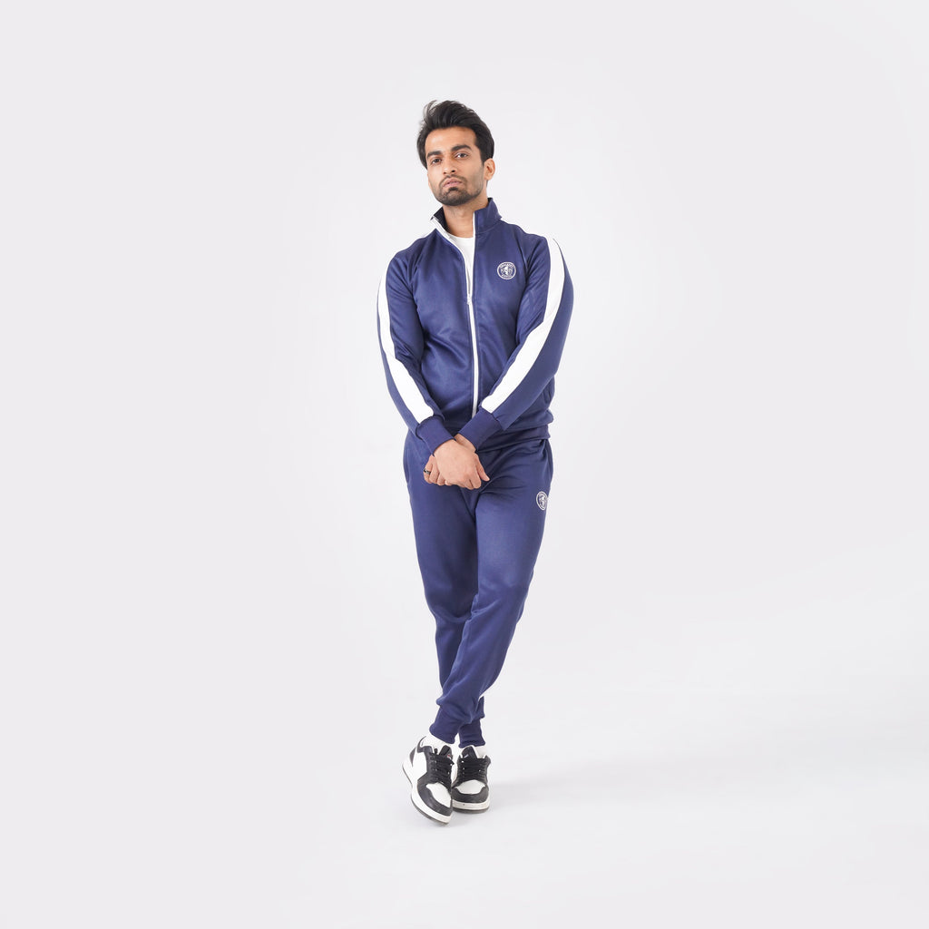 Men’s navy blue athletic tracksuit with side stripes for gym and casual style.
