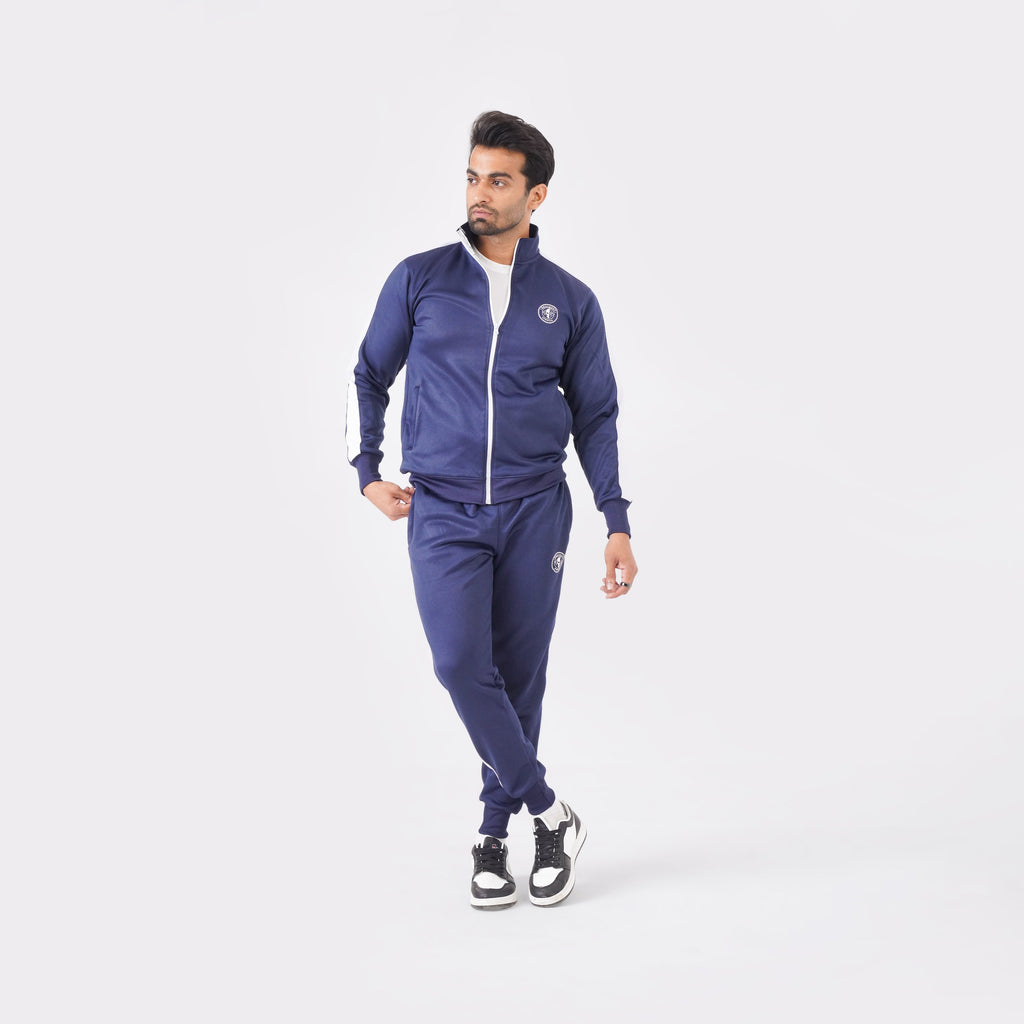 Men’s navy blue athletic tracksuit with side stripes for gym and casual style.
