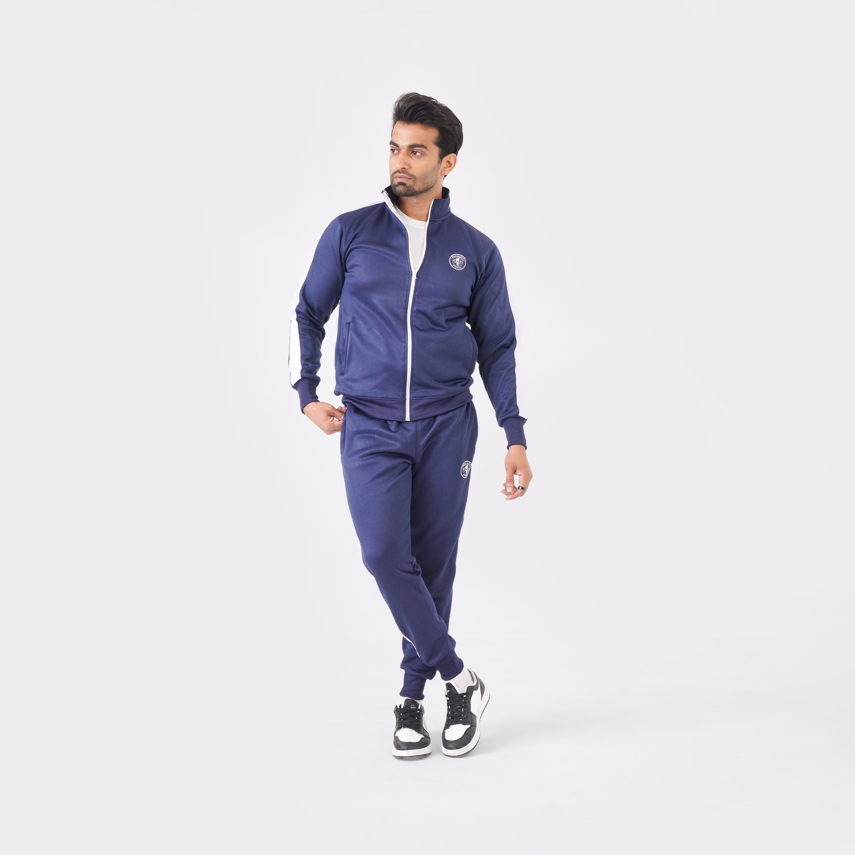 Men’s navy blue athletic tracksuit with side stripes for gym and casual style.
