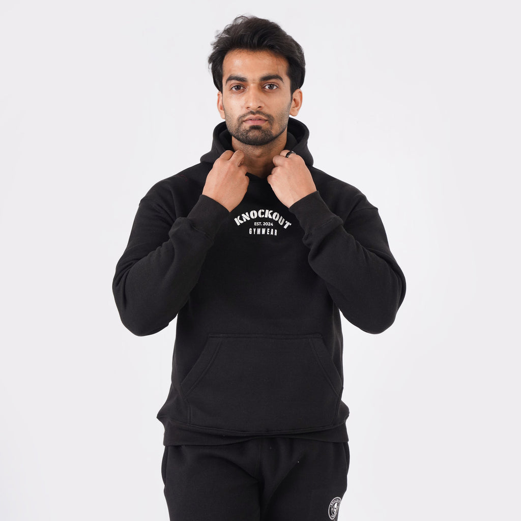 Black oversized tracksuit for men with a relaxed, comfortable fit.
