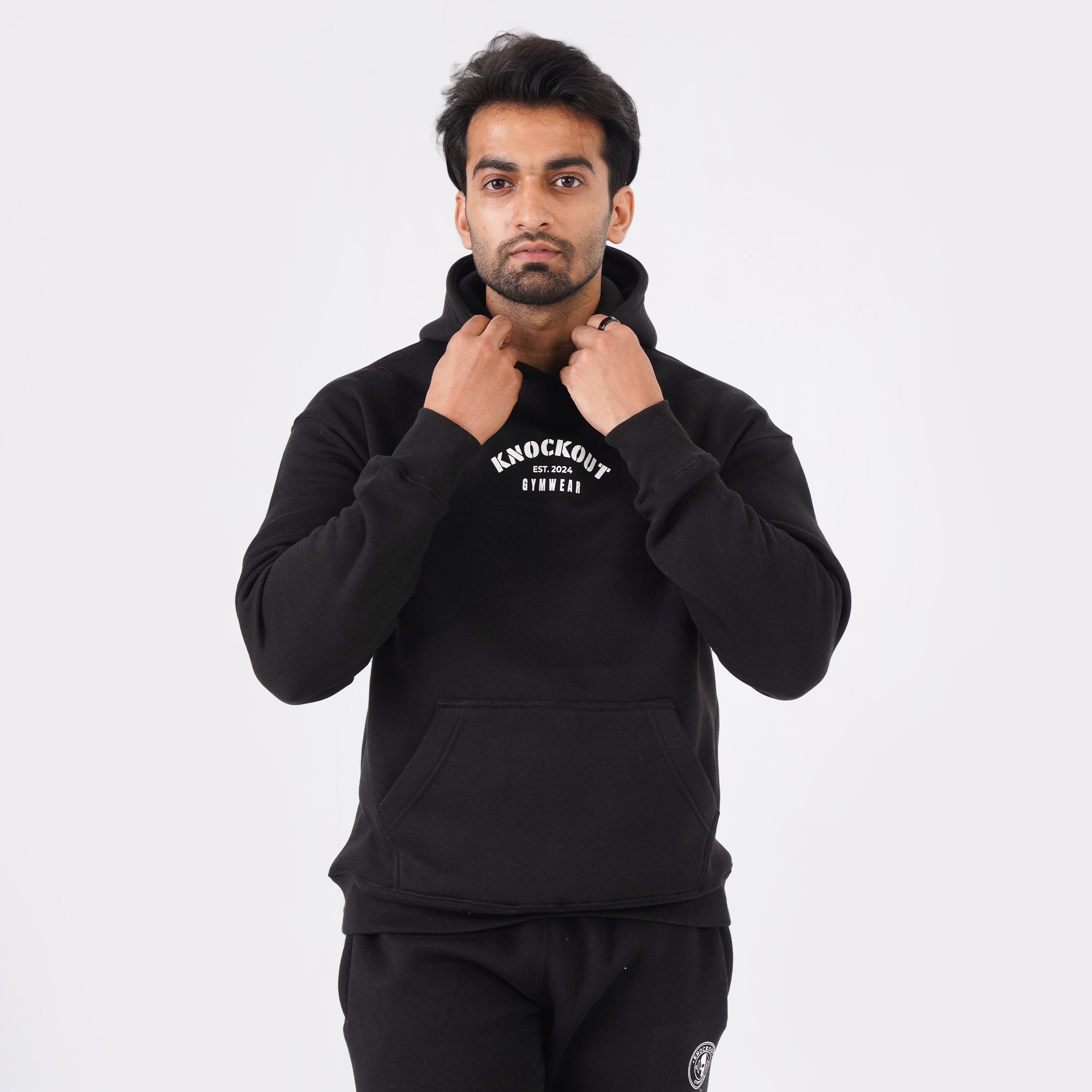 Black oversized tracksuit for men with a relaxed, comfortable fit.
